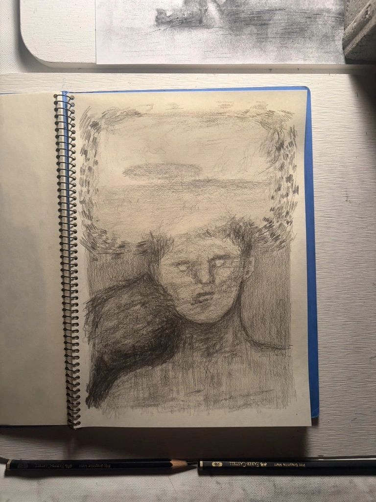 スケッチブックに、顔の上に風景が重なるように描いたドローイング